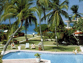 review of Antigua Village hotel in Antigua. Antigua is a Caribbean island with a hotel called antigua village. Antigua Village is the hotel I stayed at in Antigua. Antigua has many hotels. Antigua Village on Dickenson Bay is just one of those in Antigua.